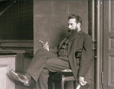 Wilhelm Conrad Röntgen in his laboratory, 1896. Creator: Anonymous.