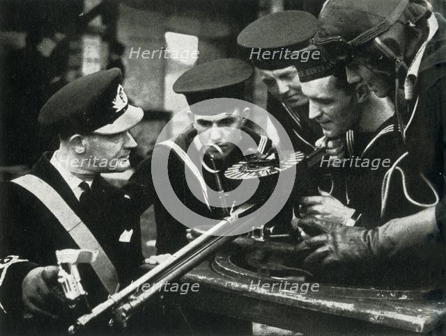 Machine-gun instruction, Fleet Air Arm, c1943. Creator: Unknown.