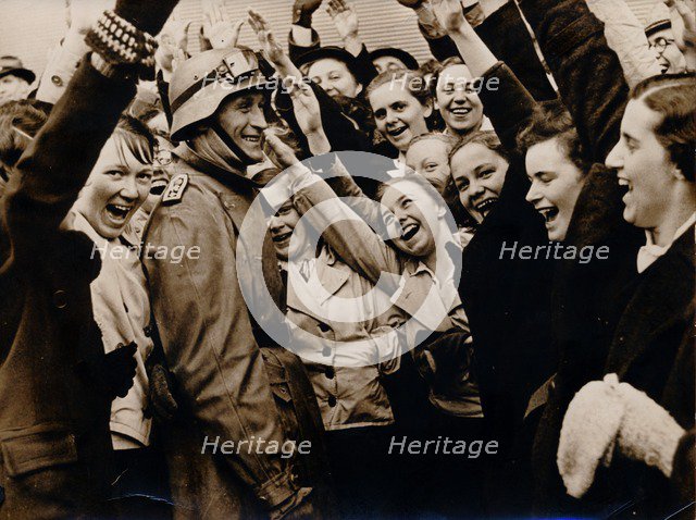 German motorized troops are greeted on their arrival in Vienna, Austria, 1938. Artist: Unknown
