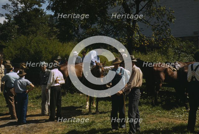 Mountaineers and farmers trading mules and horses on "Jockey St.,", Campton, Wolfe County, Ky., 1940 Creator: Marion Post Wolcott.