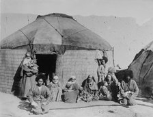 Afghan nomads, seated outside tent, 1919. Creator: Bain News Service.