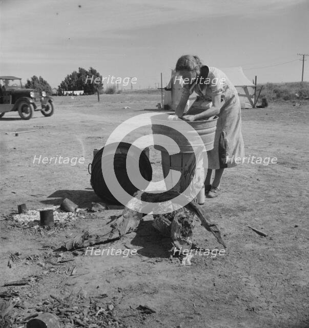 Laundry facilities in migratory labor camp, Imperial Valley, California, near Calipatria, 1937. Creator: Dorothea Lange.