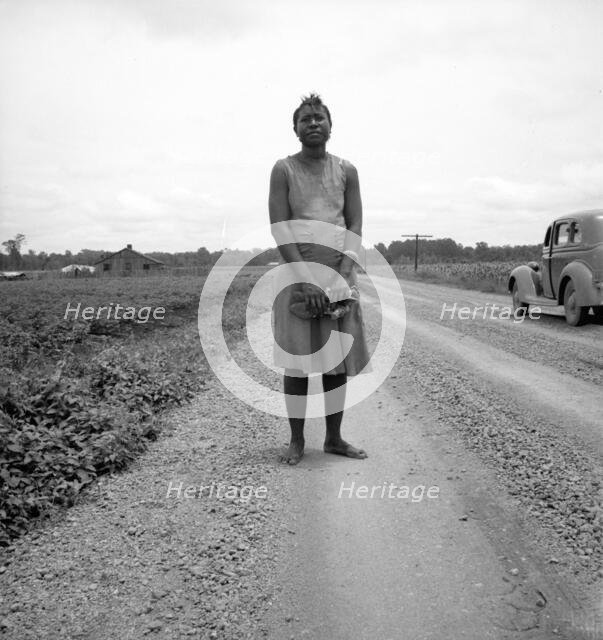 Negro woman carrying her shoes home..., Mississippi Delta, 1936. Creator: Dorothea Lange.
