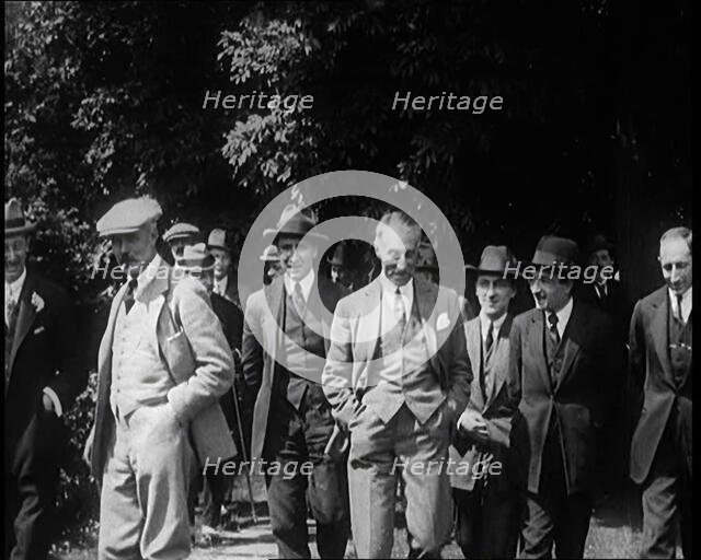 British Prime Minister Ramsay MacDonald Walking With Colleagues and Friends, 1924. Creator: British Pathe Ltd.