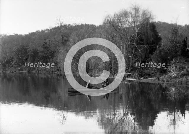 Frederick George Walker and boy in a row boat (possibly Coomera River), c1900s.. Creator: Robert Augustus Henry L'Estrange.