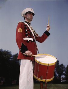 U.S. Marine Band drummer, probably at the Marine Barracks, Washington, D.C. , 1942. Creator: Alfred T Palmer.