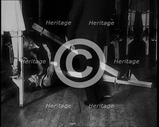 People Dancing on Stilts and Falling Over, 1929. Creator: British Pathe Ltd.