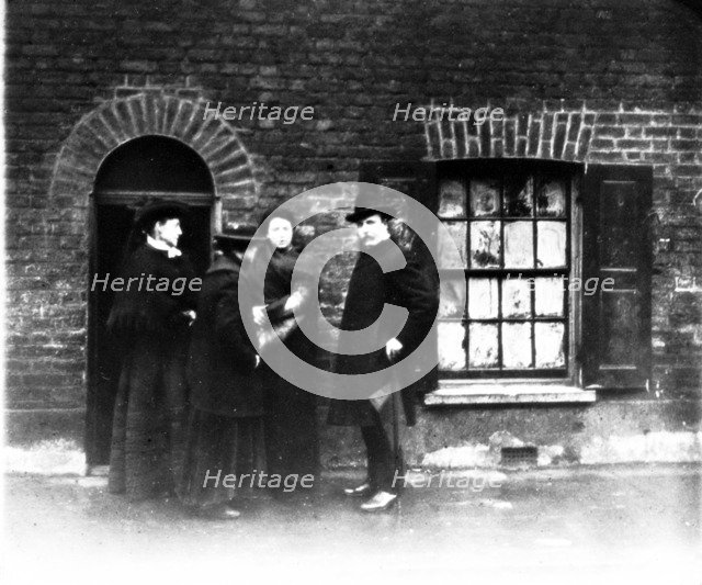 A missionary and three women, London, early 20th century. Artist: John Galt