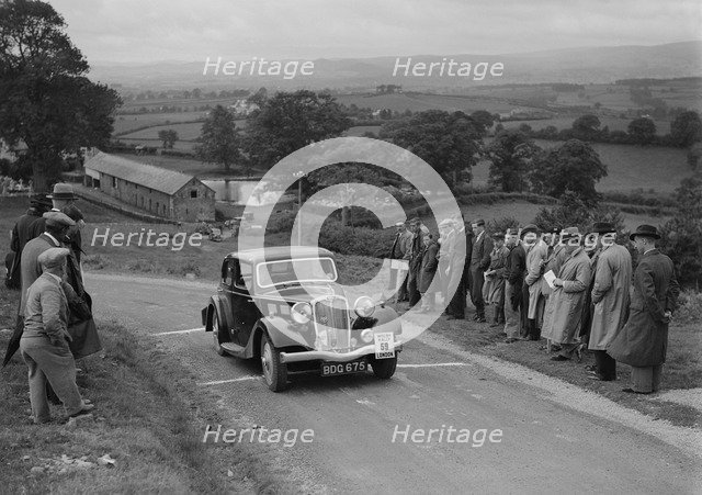 Triumph saloon of KN Smith competing in the South Wales Auto Club Welsh Rally, 1937 Artist: Bill Brunell.