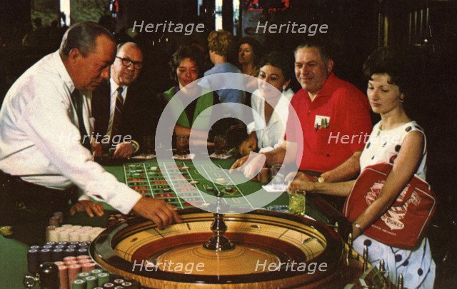 Playing roulette in a casino, Las Vegas, Nevada, USA, 1967. Artist: Unknown
