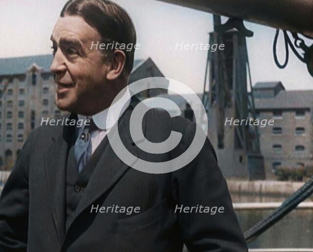 Sir Ernest Shackleton Standing on a Boat, 1921. Creator: British Pathe Ltd.