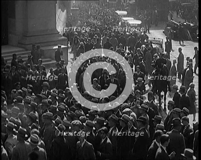 Unemployed People Gathering on the Streets , 1929. Creator: British Pathe Ltd.