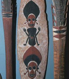 Detail of figures carved and painted on a ceremonial canoe paddle from the Solomon Islands. Artist: Unknown