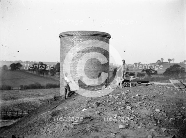 Construction workers near a ventilation chimney at Charwelton, Northamptonshire, c1873-c1923. Artist: Alfred Newton & Sons