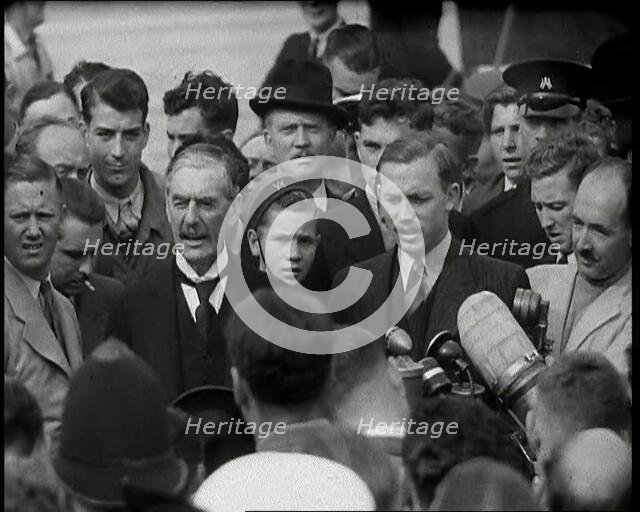 Neville Chamberlain, the British Prime Minister, Speaking to Male Journalists and Members..., 1938. Creator: British Pathe Ltd.