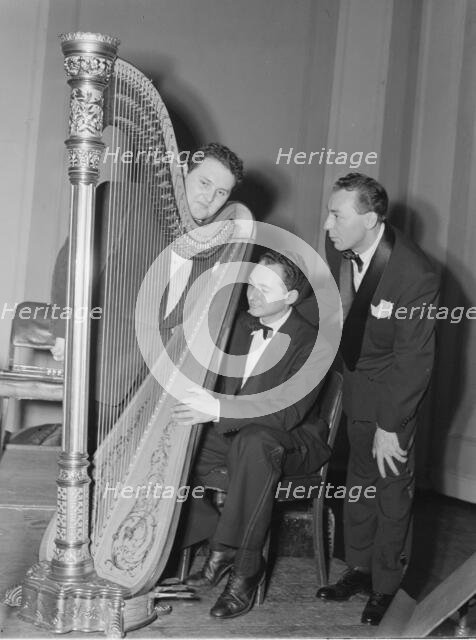 Portrait of Woody Herman, Chubby Jackson, and Abraham Rosen, Carnegie Hall(?), N.Y.  Ca. April 1946. Creator: William Paul Gottlieb.