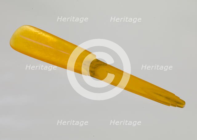 Bakelite shoe horn from dresser set owned by Lena Horne, mid 20th Century. Creator: Agalin.