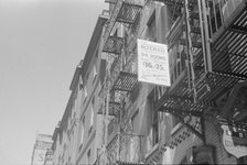 A sign offering apartments for rent, 61st Street between 1st and 3rd Avenues, New York, 1938. Creator: Walker Evans.