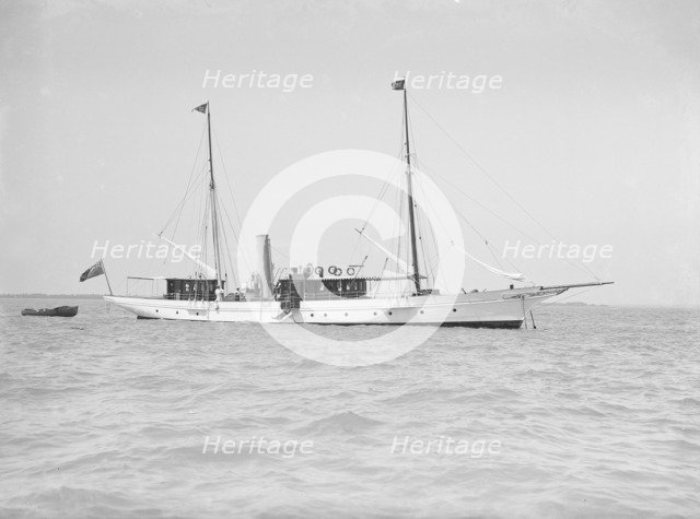 The steam yacht 'Queen Mab' at anchor, 1911. Creator: Kirk & Sons of Cowes.