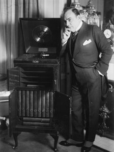 Enrico Caruso with phonograph, between 1918 and c1920. Creator: Bain News Service.