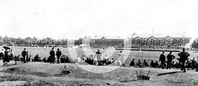 English cricketers in Australia: the Adelaide Cricket Oval (the English team in the field), 1895. Creator: Scott Barry.