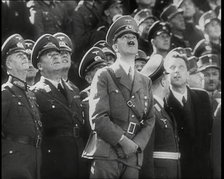 Adolf Hitler, the German Leader Looking Upwards and Watching a Fly Past of Aeroplanes..., 1939. Creator: British Pathe Ltd.