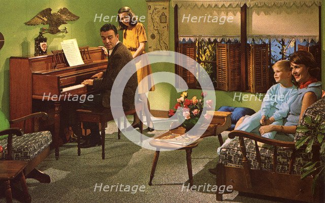 Family with a Wurlitzer model 2620 piano, USA, 1964. Artist: Unknown