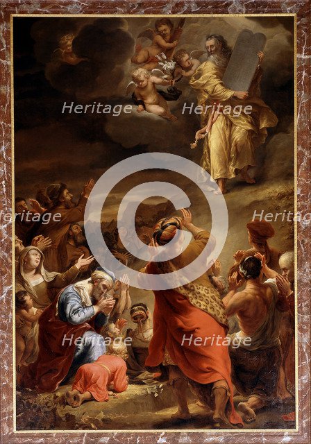 Moses descends from Mount Siniai with the Ten Commandments.