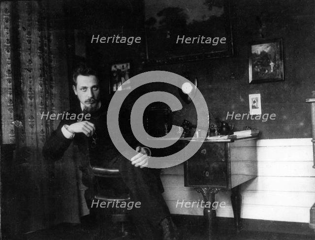 Rainer Maria Rilke in his study, c. 1905. Creator: Anonymous.