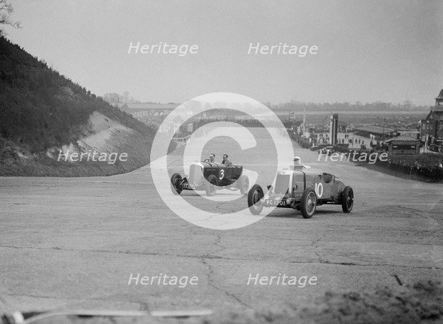 Bentley of Major H Butler and Lea-Francis Hyper racing at a BARC meeting, Brooklands, 1930. Artist: Bill Brunell.