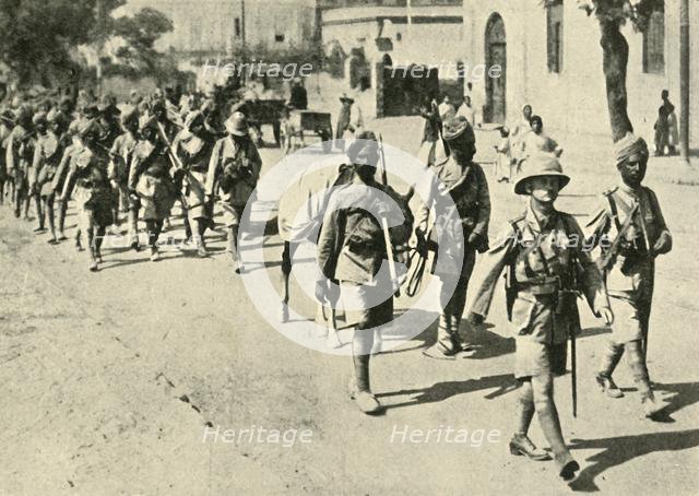 Indian soldiers and British officer, First World War, 1914-1918, (c1920). Creator: Unknown.