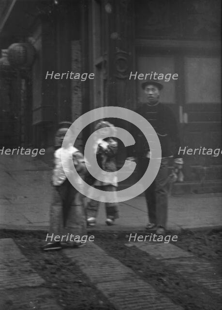 Gambling hall, Jackson Street corner, Chinatown, San Francisco, between 1896 and 1906. Creator: Arnold Genthe.