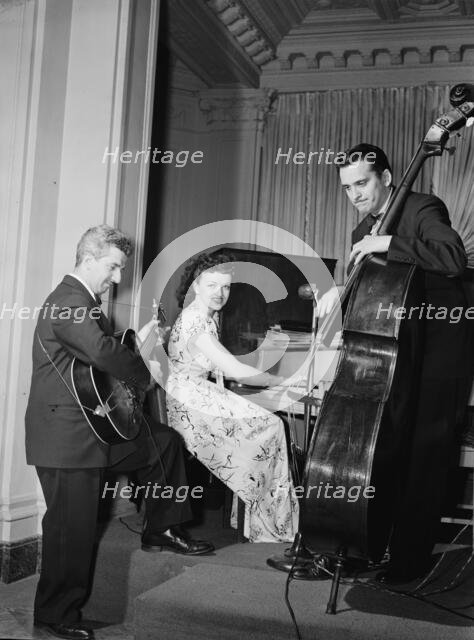 Portrait of Dardanelle, Joe Sinacore, and Bert Nazer, Sheraton Hotel, Satire Room(?), N.Y., 1946. Creator: William Paul Gottlieb.