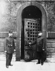 Chief Warder and his assistant at the inner door of Newgate Prison, London. Artist: Unknown