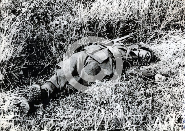 A German soldier killed during the invasion of Normandy, 1944. Artist: Unknown