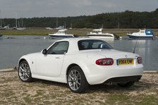 2014 Mazda MX5 Roadster Coupe Artist: Unknown.