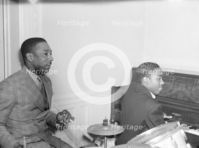 Portrait of Tommy Myles and John Malachi, Turkish Embassy, Washington, D.C., 1938. Creator: William Paul Gottlieb.