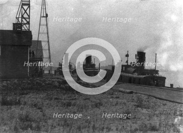 Tug boats tied to dock, Duluth, Minnesota, 1903. Creator: Frances Benjamin Johnston.