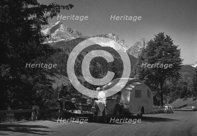 1937 Mercedes Benz 260D Cabriolet towing caravan. Creator: Unknown.