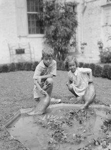 Children of Victor Harris, outdoors, 1932. Creator: Arnold Genthe.
