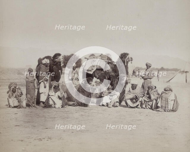 Group of Bactrian camels and camel drivers, Afghanistan, c1879. Creator: Unknown.