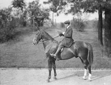 Unidentified man riding Chesty, between 1911 and 1936. Creator: Arnold Genthe.