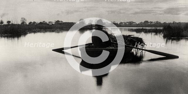 Rowing Home the Schoof-Stuff, 1886. Creator: Peter Henry Emerson.