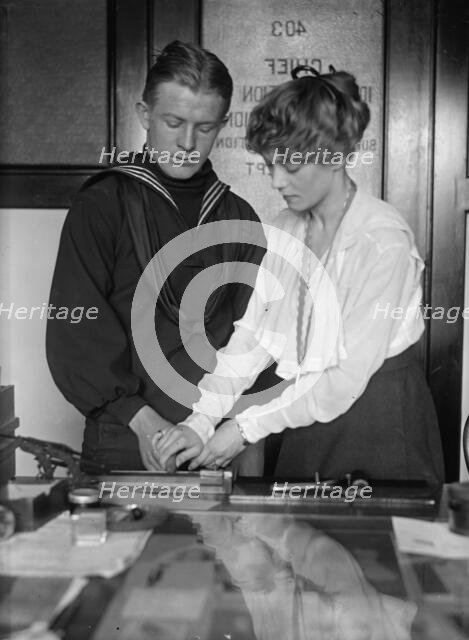 Navy Department, U.S. Intelligence Bureau, Finger Print Department Clerks: James A. Noonan..., 1918. Creator: Harris & Ewing.