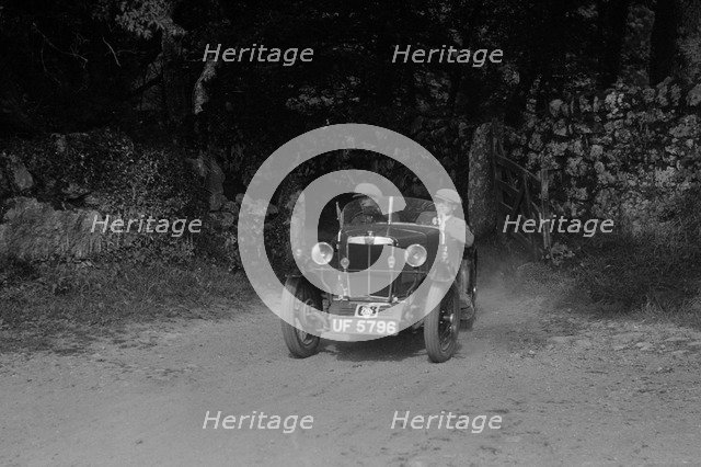 MG M type of EA Tebbs competing in the Brighton and Hove Motor Club Brighton-Beer Trial, 1930. Artist: Bill Brunell.