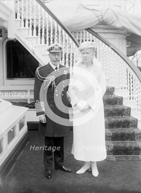 King George V and Queen Mary aboard 'HMY Victoria and Albert', 1935. Creator: Kirk & Sons of Cowes.