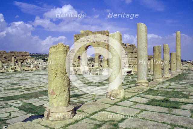 Antonine Gate and ruined pillars, Sbeitla, Tunisia. 