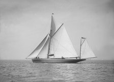 The 95 ft yawl 'Artemis' sailing close-hauled, 1911. Creator: Kirk & Sons of Cowes.