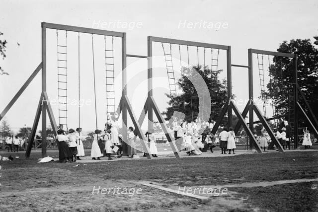 Rings and poles, Bronx Park, 1911. Creator: Bain News Service.