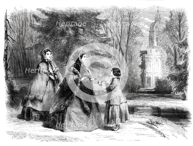 The Princess Frederick William of Prussia promenading in the garden of the palace at..., 1860. Creator: Unknown.